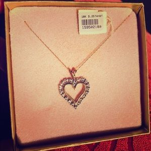 Vintage gold heart pendant with diamond accent